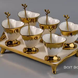 Gold dessert serving set with six bowls and spoons on rectangular tray