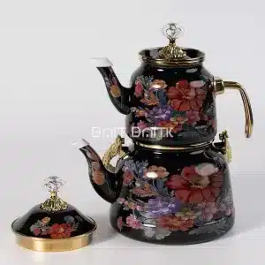 Stacked black floral kettles with gold accents and crystal-style lid